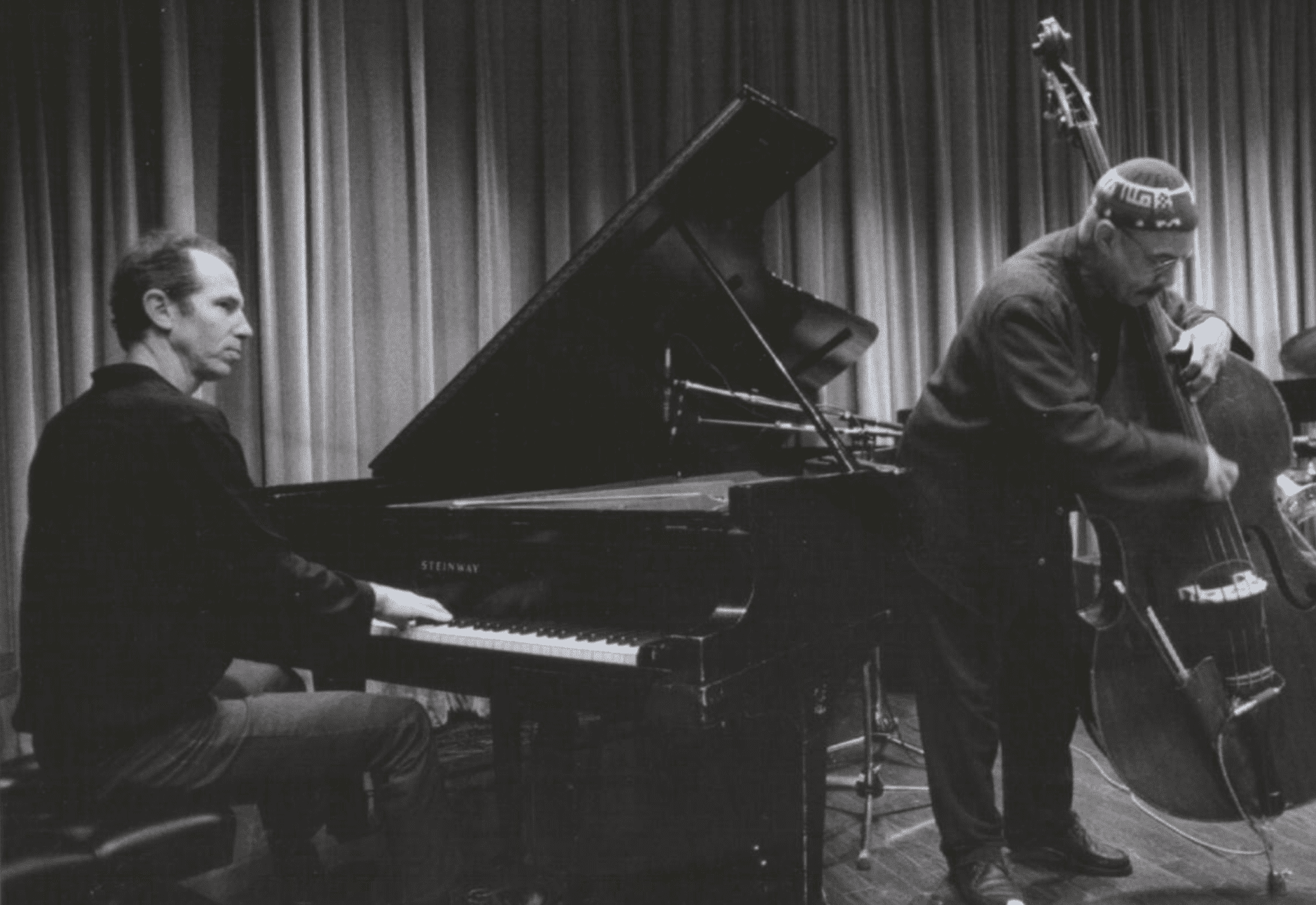 Steve Cohn playing piano with a bass player